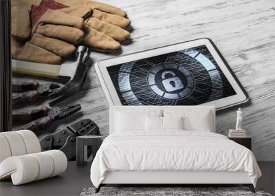 Web security and technology concept with tablet pc on wooden tab Wall mural