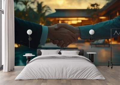 Two men shake hands in front of a pool. Wall mural