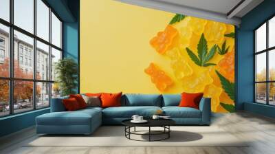 Cannabis Infused Gummies and Treats on Yellow Background with Leaves Wall mural