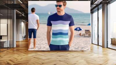 Carefree man enjoying beach vacation in casual summer attire Wall mural