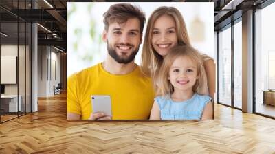 Happy family relaxing together and smiling at home Wall mural