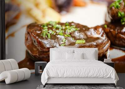 Delicious dish of fried beef steaks with sauce Wall mural