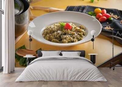 Tasty Fusilli with cheese on plate Wall mural