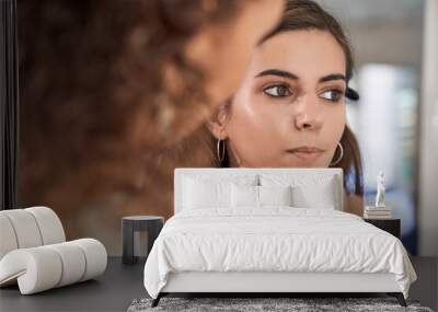 Unrecognizable woman applying cosmetic product on client Wall mural