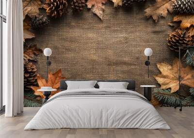 Autumn Leaves and Pine Cones Bordering a Brown Burlap Background Wall mural