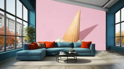 Creative layout with ice cream cone up side down and vanilla ice cream scoop with pearls on pastel pink background. Summer dessert aesthetic idea. Trendy food lay out. Wall mural