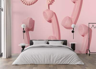 Creative layout with pink retro phone handsets on pastel pink background. 80s or 90s retro fashion aesthetic telephone concept. Minimal romantic handset idea. Valentines day idea. Wall mural