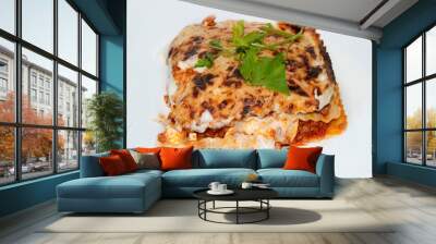 Portion of lasagna bolognese isolated on white background Wall mural