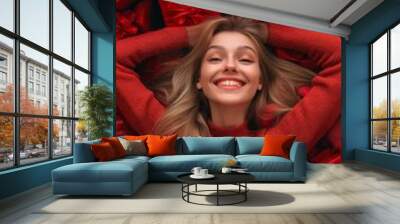 an funny image with in the center a beautiful smiling young lady buried under lot of red gifts, set design, advertising picture, woman buried in gifts smiling Wall mural