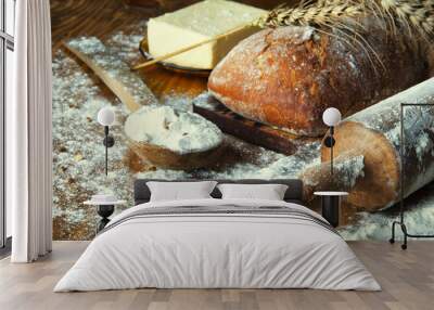 Bread and additions on a wooden table Wall mural