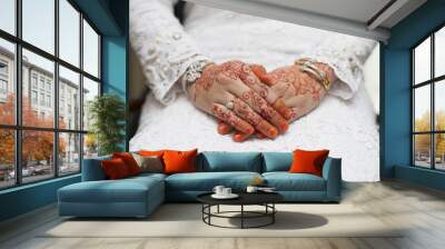 bridal hand with henna paintings and gold bracelets Wall mural