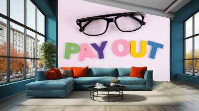 Pay Out concept with wooden block Wall mural