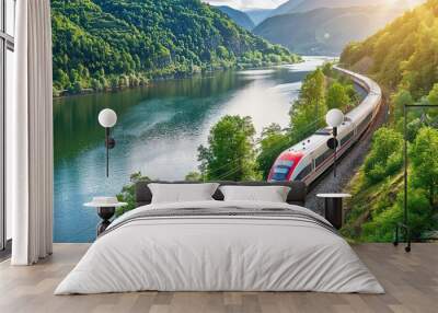 high-speed train driving through a beautiful landscape with a river and a forest - preserving nature with sustainable transportation Wall mural