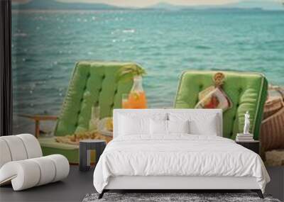 Landscape view of ocean with two green sofa  Wall mural