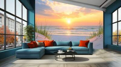 Serene Sunset Over the Ocean with Grass on the Shoreline Wall mural