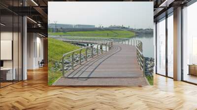 Boyukshor Lake in Baku Azerbaijan . According to geological data, the average depth of the water in the lake is 3.40-3.95 meters . An oval bridge from iron and wood on the edge of the lake . Wall mural