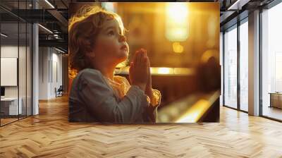 Young baby girl pray in church Christian life crisis prayer to god. Children Hands praying to god with bible on sunlight glare. Wall mural