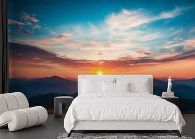 Stunning sunset over mountains with vibrant colors and dramatic sky. Wall mural