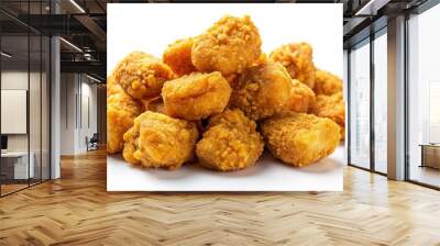 Crispy golden nuggets of mouthwatering goodness sit tantalizingly on a clean white background, inviting all to indulge in a savory and satisfying snack attack. Wall mural