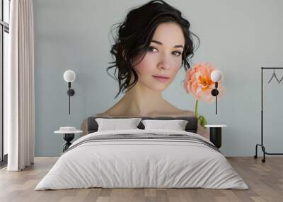 Pretty woman holding a prop like a flower or accessory with a romantic touch: Adding a whimsical touch, she creates a romantic pose. photo on white isolated background Wall mural