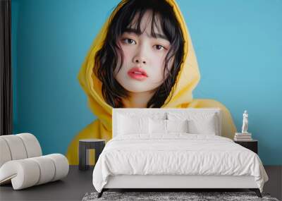 Asian Woman in Yellow Hoodie Portrait Wall mural