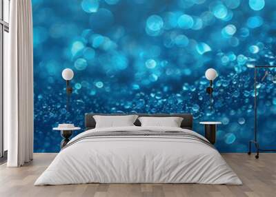 b'Blue water droplets on a blue background with a blurred background' Wall mural