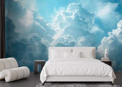 Bright and fluffy white cloudscape with a few wispy clouds drifting in the foreground Wall mural