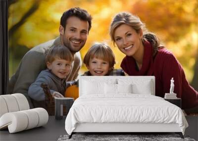 Happy Family of Four Enjoying Autumn Day with Pumpkin in Basket Wall mural