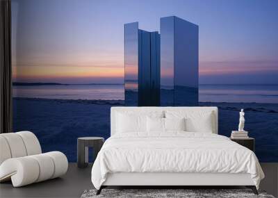 Reflective Columns Standing on a Beach at Sunset Wall mural