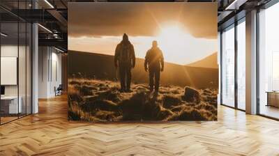 Two Hikers Walking Towards the Sunset Wall mural