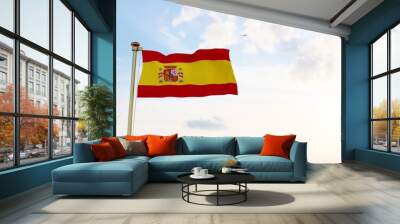 Flag of Spain waving in the wind, sky and sun background. Spain Flag.	
 Wall mural