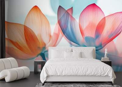 Two flowers with pink and orange petals are shown in a blue and white background Wall mural