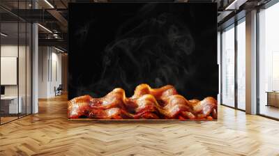 Pile of Sizzling Bacon Isolated on Black Wall mural