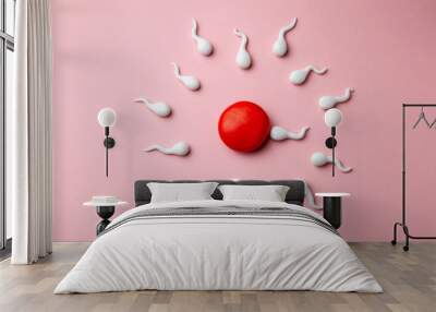 active sperm cells swim to the egg on a pink background. the concept of pregnancy, fertilization of  Wall mural