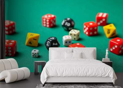 Collection of colored gaming dice cubes on green table Wall mural