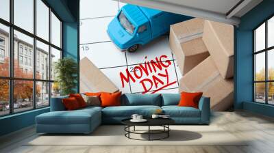 Moving day on the calendar is written in red. Calendar with a note with cardboard boxes and truck. Wall mural