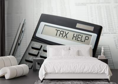 tax help. on display of calculator is written tax help Wall mural