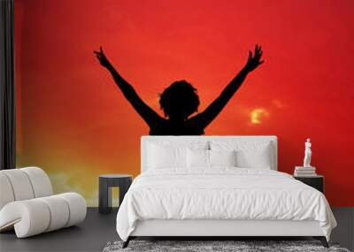 Happy girl at sunset Wall mural