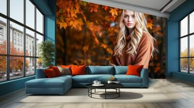 A young fashionable blonde woman in an Autumnal setting Wall mural