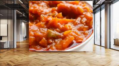 Bowl of chakalaka. A traditional South African accompaniment or side dish served with bread, rice, mash, pap. Made from a variety of vegetables usually including carrots, peppers, tomato and onion  Wall mural