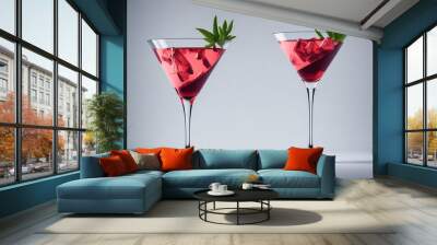 Double trouble: two red cocktails in martini glasses Wall mural