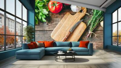 food cooking background ingredients for preparation vegan dishes vegetables roots spices and herbs old cutting board healthy food concept rustic wooden table background top view Wall mural