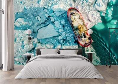 An ice breaker breaking ice, aerial view Wall mural