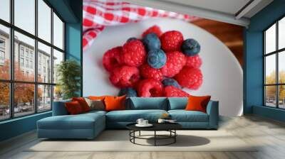 raspberries and Blueberries on a plate Wall mural