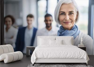 Attractive businesswoman woman posing at her work place with coworkers in the background. Generative AI	
 Wall mural