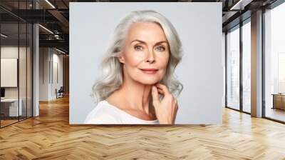 Beautiful gorgeous 50s mid aged mature woman looking at camera isolated on white. Mature old lady close up portrait. Healthy face skin care beauty, middle age skincare cosmetics. Generative AI Wall mural