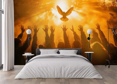 Crowd of people raising hands worshiping the Holy Spirit flying over the crowd of believers Wall mural