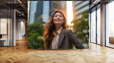 Happy wealthy rich successful asian businesswoman standing in big city modern skyscrapers street on sunset thinking of successful vision, dreaming of new investment opportunities. Generative AI Wall mural