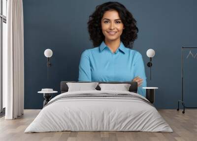 Happy young smiling confident professional business woman wearing blue shirt, pretty stylish female executive looking at camera, standing arms crossed isolated at gray background,  Wall mural