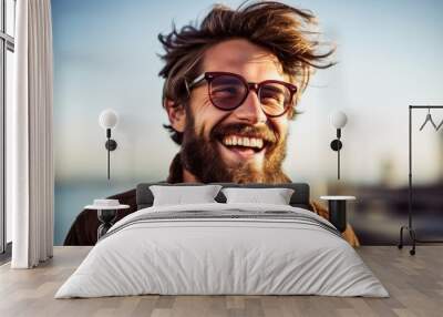 Laughing young man wearing a long hipster beard looking at the camera. Generative AI Wall mural